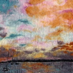 harbour art of three boats in kinvara harbour in Ireland. A beatiful orange and pink sunset. Felt landscape by Janine Jacques