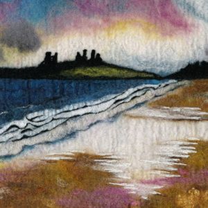 Northumberland felt painting of the beach approach to Dunstanburgh Castle with a beautiful sky and a sea view.
